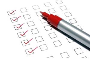 checklist with pen lying on top