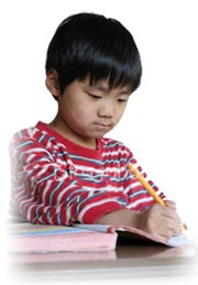 student writing in workbook