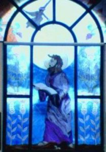 stained glass depiction of saint matthew