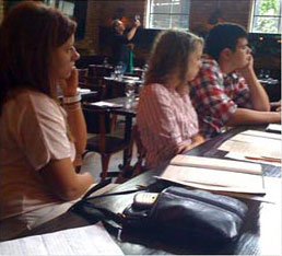students participating in meeting inside restaurant