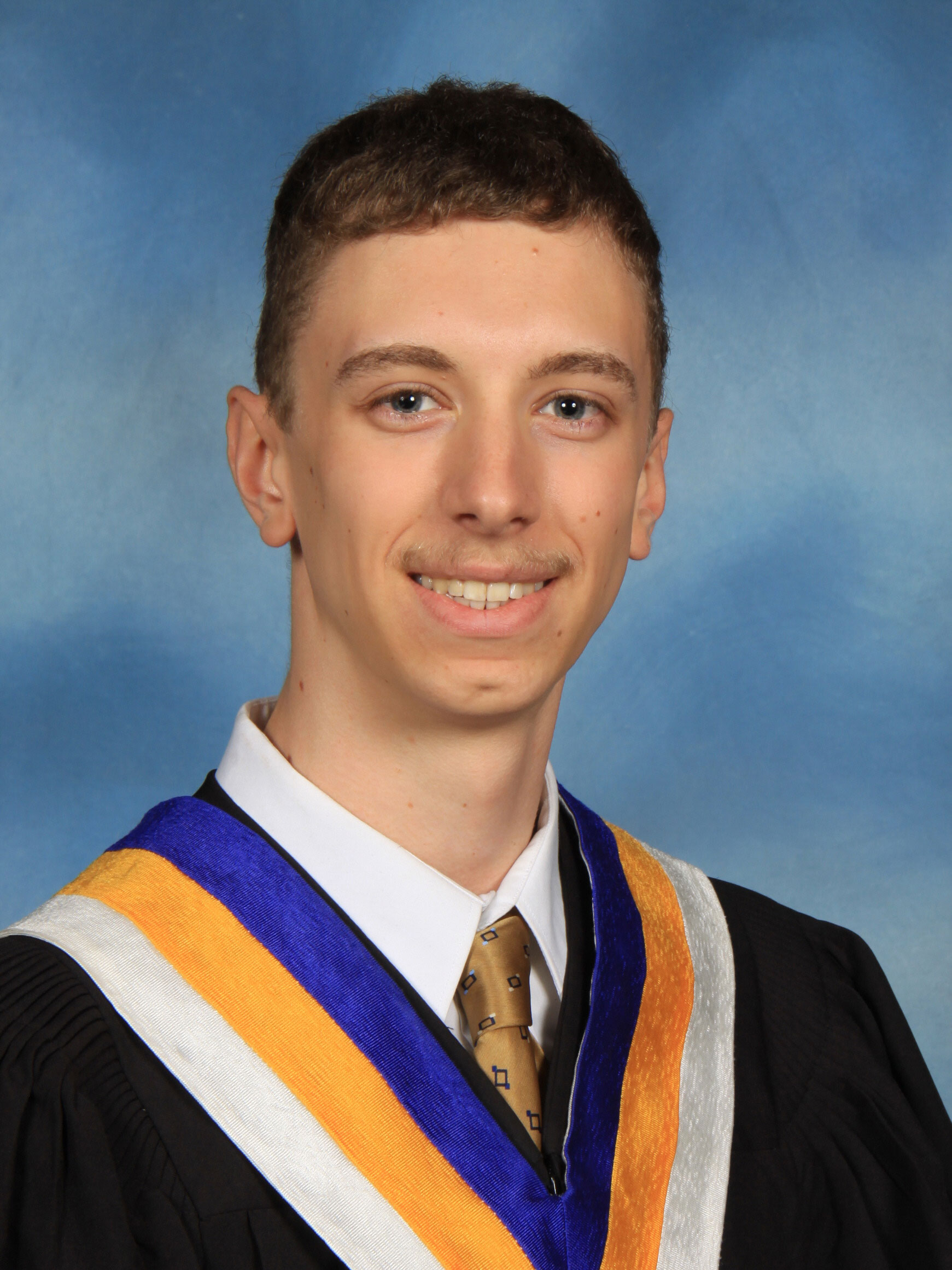 A graduation photo of Andrew Clarke 