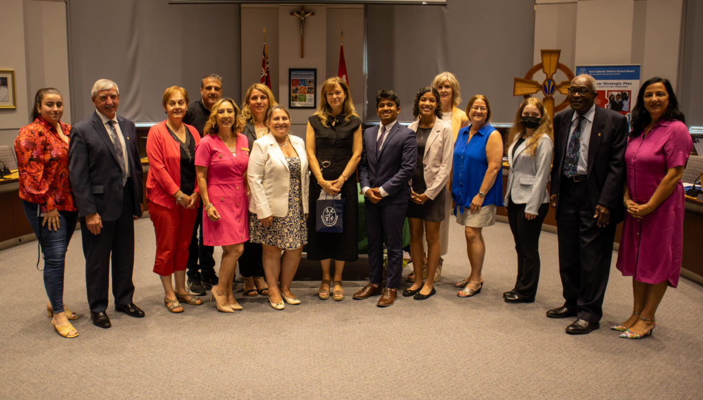 A photo of Retiring Superintendent of Exceptional Learners Diana Candido with members of the Board of Trustees in the YCDSB Boardroom. 