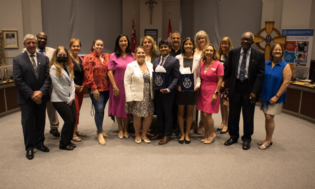 Senior Student Trustees Jonah James and Amira Zamanifar who graduated this year are recognized in the YCDSB Boardroom with members of the Board of Trustees. 