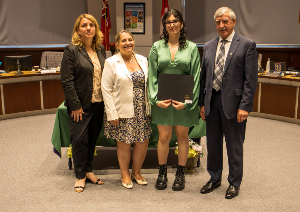 In photo: Atrin Movashehi Asr of Cardinal Carter CHS won a gold medal for Workplace Safety at the Ontario National Skills Competition and a silver medal for Workplace Safety at the Skills Canada National Competition 2024. Pictured in the YCDSB Boardroom with Vice Chair Maria Iafrate and Interim Director of Education John De Faveri. 