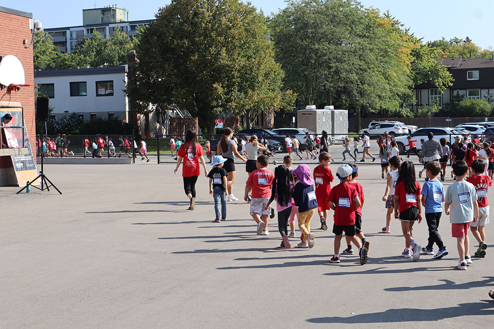 St. Patrick CES students head out on their fundraising run/walk/roll for the Terry Fox Foundation.