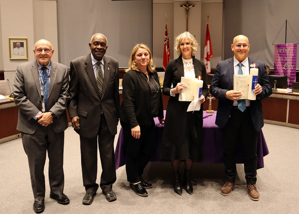 The commissioning of Associate Director Jennifer Sarna and Superintendent of Education Lou Paonessa