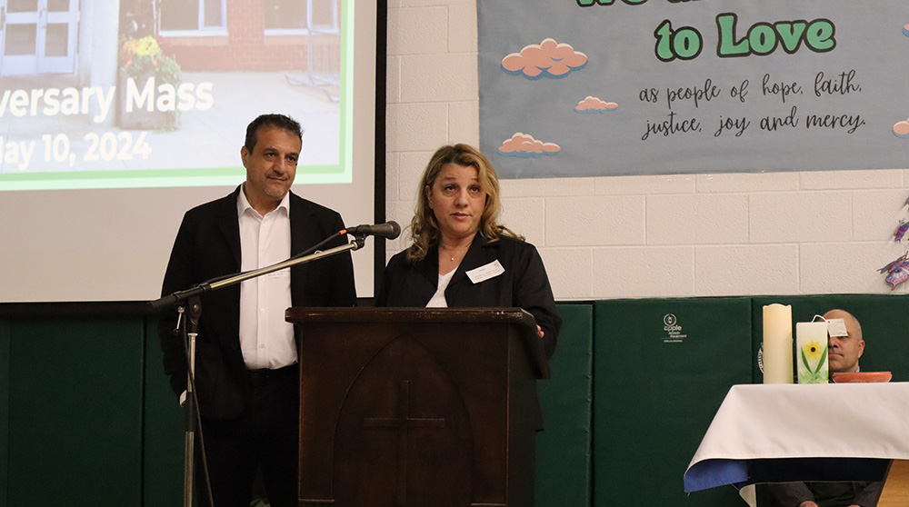 Vice Chair Maria Iafrate and Trustee Joseph DiMeo speak at the Father Henri Nouwen CES anniversary