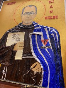 YCDSB grandparent, inspired by his faith, donates painting of St. Maximilian Kolbe to namesake school