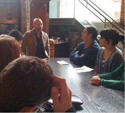 students participating in meeting inside restaurant